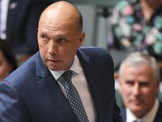 Australian Minister for Home Affairs Peter Dutton reacts during House of Representatives Question Time at Parliament House in Canberra, Tuesday, September 11, 2018. (AAP Image/Lukas Coch) NO ARCHIVING