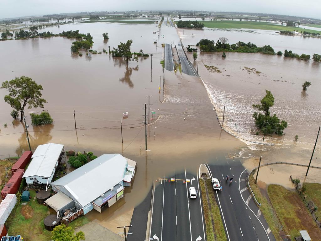 The Warrego Highway is cut by flooding in the Lockyer Valley. Picture: Lyndon Mechielsen