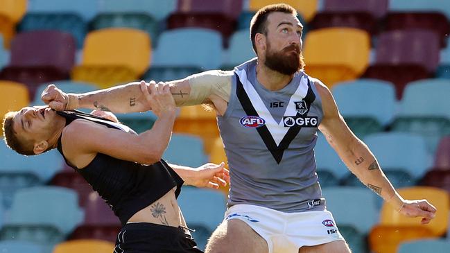 Port Adelaide’s Charlie Dixon pushes Carlton’s Liam Jones. Picture: Michael Klein