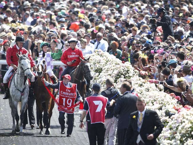 Jockey Michelle Payne salutes the crowd after winning last year’s Melbourne Cup on Prince Of Penzance. Picture: David Caird