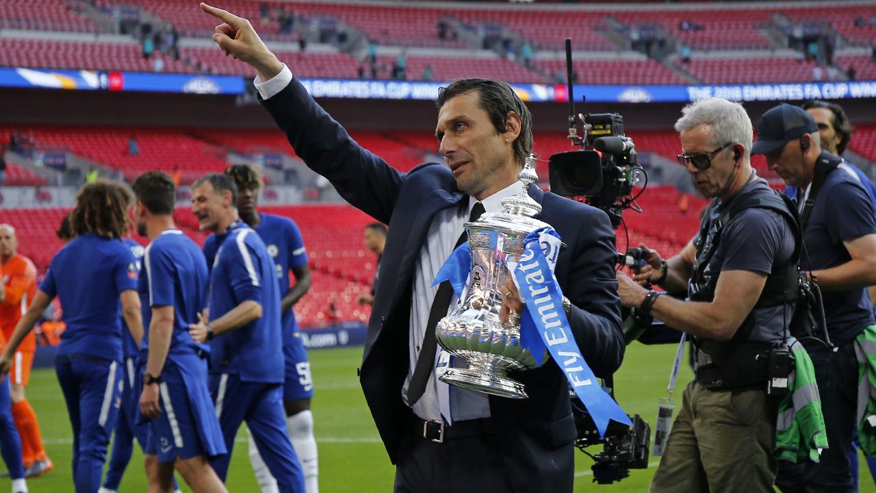 CAntonio Conte gestures to the Chelsea supporters after winning the FA Cup.