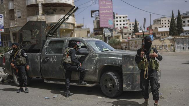 Members of Syria’s security forces deploy in the town of Sahnaya, south of Damascus, after clashes erupted between members of the minority Druze sect and pro-government fighters that left scores dead. Picture: AP