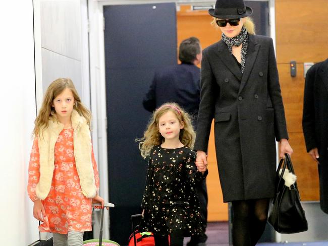 Kidman arrives at Sydney Airport with her two daughters. Picture: Stephen Cooper