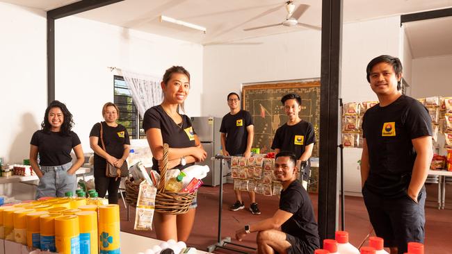 Darwin has a long history of mateship with people from the Philippines. Pictured here are Filipino-Darwin volunteers who collecting goods to donate to international students during the coronavirus pandemic. From left: Joy Audelie Nava, Peachy Tugano, Em Wills, Abet Tabiolo, Jurse Salandanan, Neil Sayat and Dave Jacinto. Picture: Che Chorley