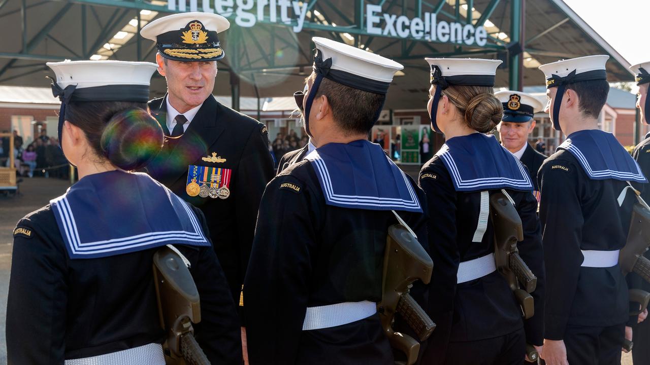 Co-Head ADF Recruitment and Retention Tiger Team, Rear Admiral Robert Plath, AM, RAN, inspects graduating sailors of General Entry 402 Taylor Division on the Recruit School Parade Ground, HMAS Cerberus, Victoria in 2022.