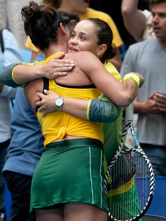 Ash Barty and Ajla Tomljanovic embrace at the Fed Cup Final tennis competition in 2019. Picture: Fiona Hamilton