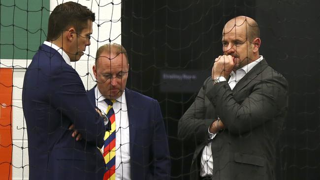 Former Crows CEO Andrew Fagan, chairman Rob Chapman and Mark Ricciuto in the rooms after the 2017 Grand Final loss to Richmond. Picture: Sarah Reed