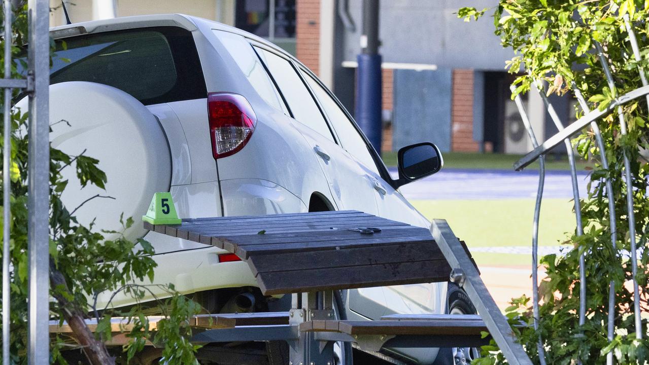 Woman charged after fatal crash at school