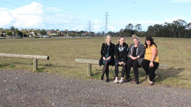 Cr Amanda Cooper, Bramble Bay Pony Club member Keely Surman, secretary Amy Jenkinson and president Maree Surman at the new site for the club at Fitzgibbon. Telegraph Rd is on the left. Picture: Michelle Smith