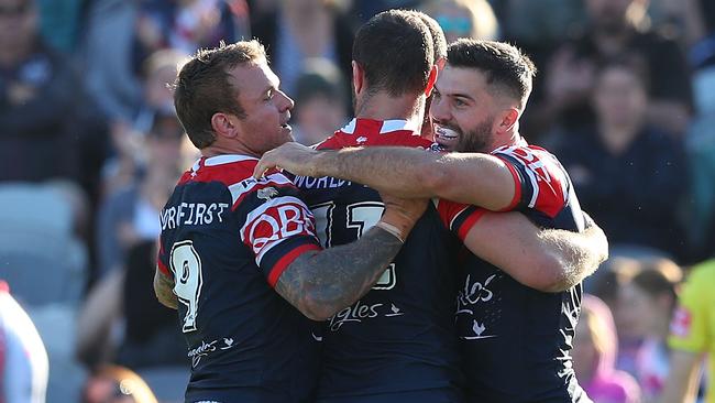 GOSFORD, AUSTRALIA — MAY 26: Roosters players celebrate a try during the round 12 NRL match between the Sydney Roosters and the Gold Coast Titans at Central Coast Stadium on May 26, 2018 in Gosford, Australia. (Photo by Tony Feder/Getty Images)