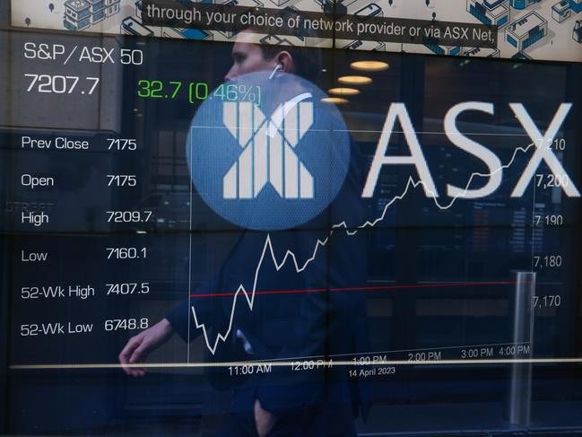 SYDNEY, AUSTRALIA - NewsWire Photos - APRIL 17 2023 -A general view of a person walking past the  Australian Stock Exchange at the ASX in central Sydney. Picture NCA NewsWire / Gaye Gerard