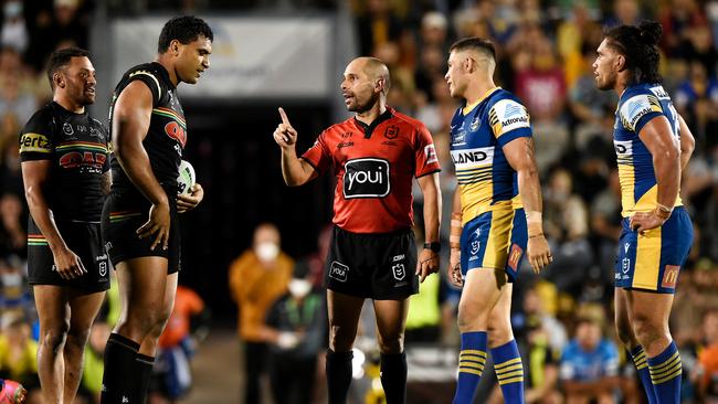 Referee Ashley Klein speaks to Tevita Pangai Junior during the high-octane semi-final. Picture: Getty