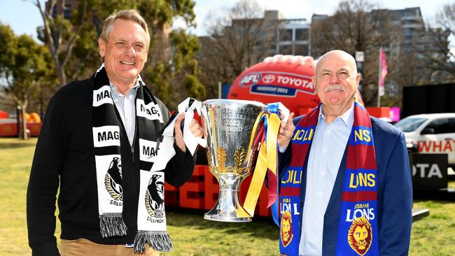 Peter Moore and Leigh Matthews with the premiership cup. Picture: Josh Chadwick/AFL Photos via Getty Images