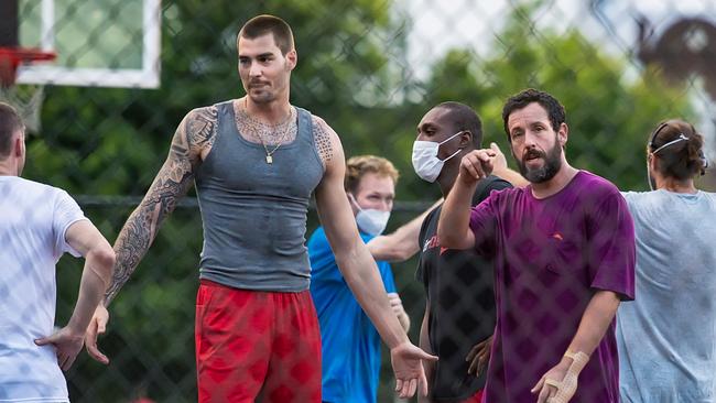 NBA forward Juancho Hernangómez and Adam Sandler are seen on the set of Netflix feature film, ‘Hustle’. Picture: Gilbert Carrasquillo/GC Images