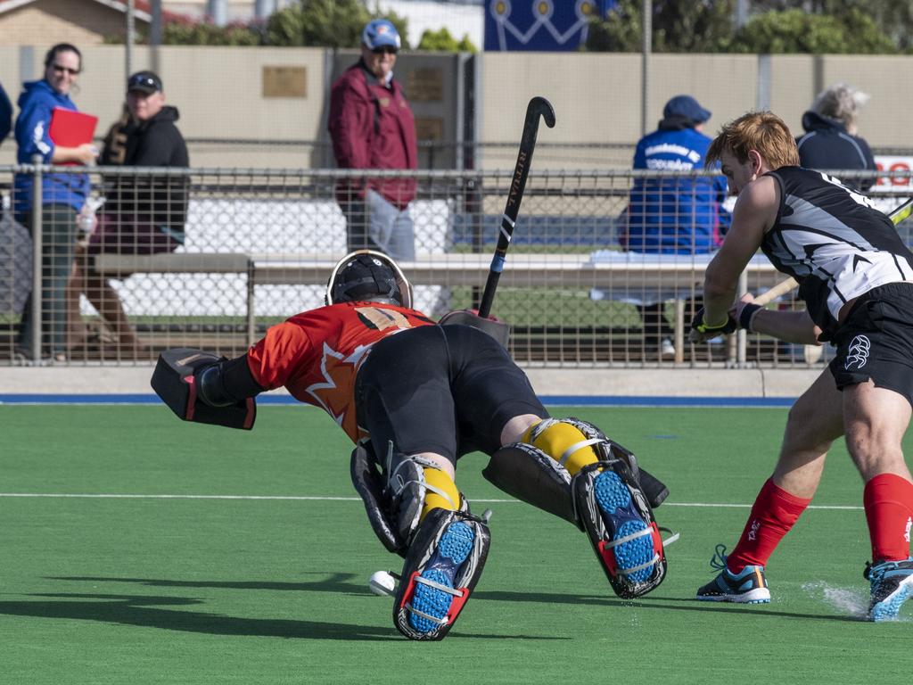 Cade Banditt, Ipswich and Ryan Wagner, Mackay. Ipswich vs Mackay. Hockey Queensland Championship. Saturday, May 1, 2021. Picture: Nev Madsen.