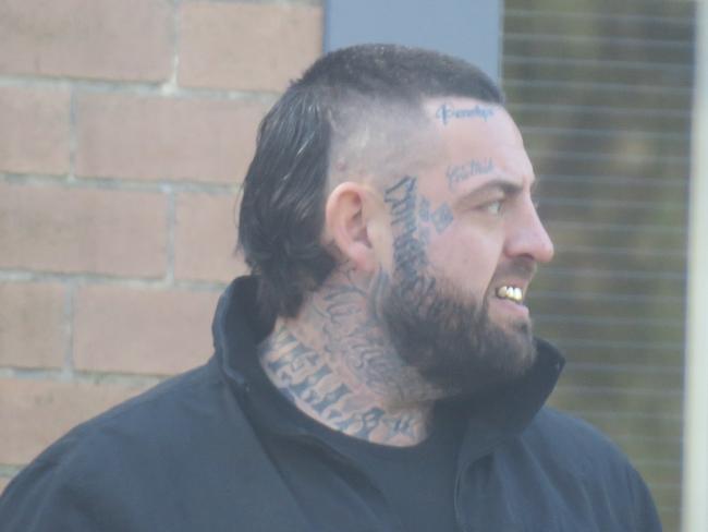 New ink: Former Rebels bikie Vella has a “Comanchero” tattoo on the side of his face. Picture: NewsLocal