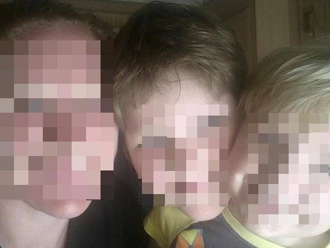 The mother accused of killing her two young boys, aged 9 and 7, can’t be identified for legal reasons.