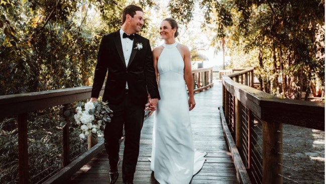 Ash Barty stunned in a white halter neck wedding gown. Picture: Instagram @ashbarty