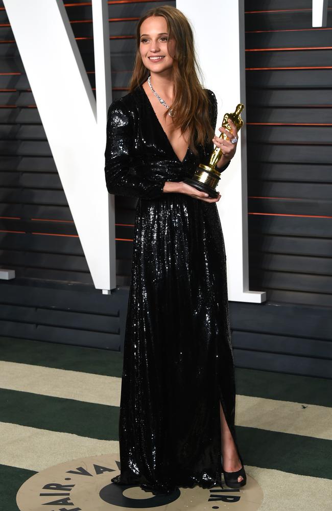 Alicia Vikander arrives at the Vanity Fair Oscar Party on Sunday, Feb. 28, 2016, in Beverly Hills, California. (Photo by Evan Agostini/Invision/AP)