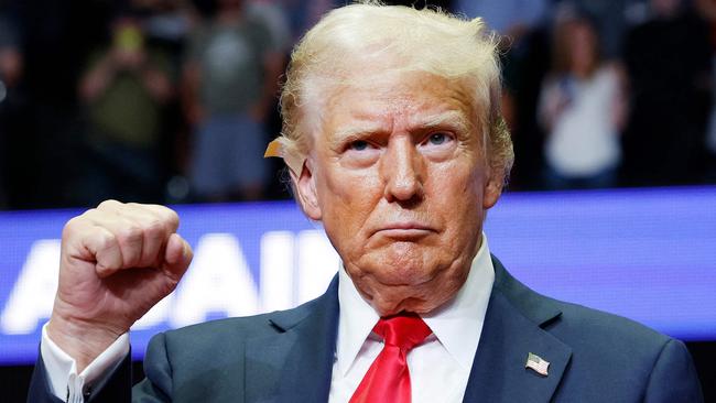 GRAND RAPIDS, MICHIGAN - JULY 20: Republican presidential nominee, former U.S. President Donald Trump speaks during a campaign rally at the Van Andel Arena on July 20, 2024 in Grand Rapids, Michigan. Trump's campaign event is the first joint event with his recent vice presidential pick Sen. JD Vance (R-OH) and the first campaign rally since the attempted assassination attempt his rally in Butler, Pennsylvania.   Anna Moneymaker/Getty Images/AFP (Photo by Anna Moneymaker / GETTY IMAGES NORTH AMERICA / Getty Images via AFP)