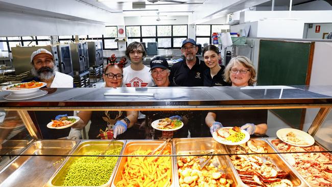 The Cairns Community Christmas Lunch served over 300 traditional Christmas meals to the disadvantaged and those in need at St Augustine's College in 2023. Cairns Community Christmas cooks Patrick Singh, Kristan Lum, Mitchell Parsons, John Parsons, Glen McKenzie, Keely McKenzie and Kerry McKenzie. Picture: Brendan Radke