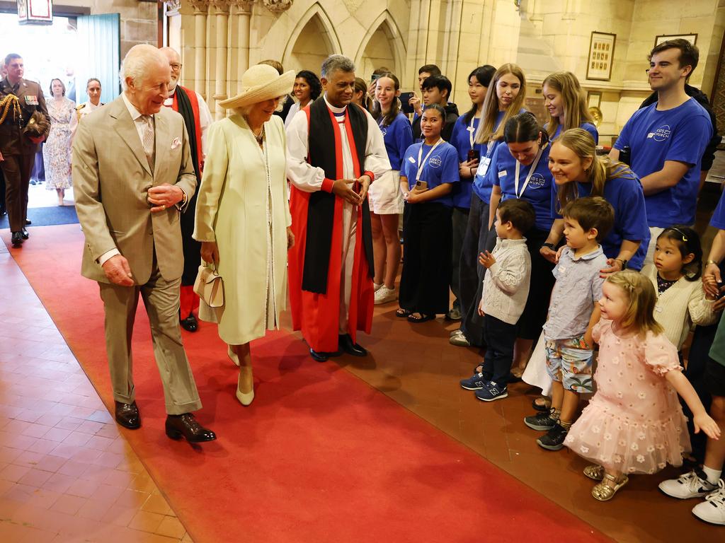 A little girl does a curtsy as the royals arrive at St Thomas’ Anglican Church in North Sydney. Picture: Rohan Kelly