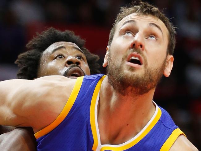 LOS ANGELES, CA - NOVEMBER 19: Andrew Bogut #12 of the Golden State Warriors blocks out DeAndre Jordan #6 of the Los Angeles Clippers during the second half of a game at Staples Center on November 19, 2015 in Los Angeles, California. NOTE TO USER: User expressly acknowledges and agrees that, by downloading and or using this photograph, User is consenting to the terms and conditions of the Getty Images License Agreement. (Photo by Sean M. Haffey/Getty Images)