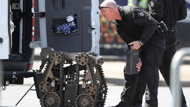 The bomb squad has put Racecourse Rd in lockdown after a bomb scare. Picture: AAP Image/David Crosling