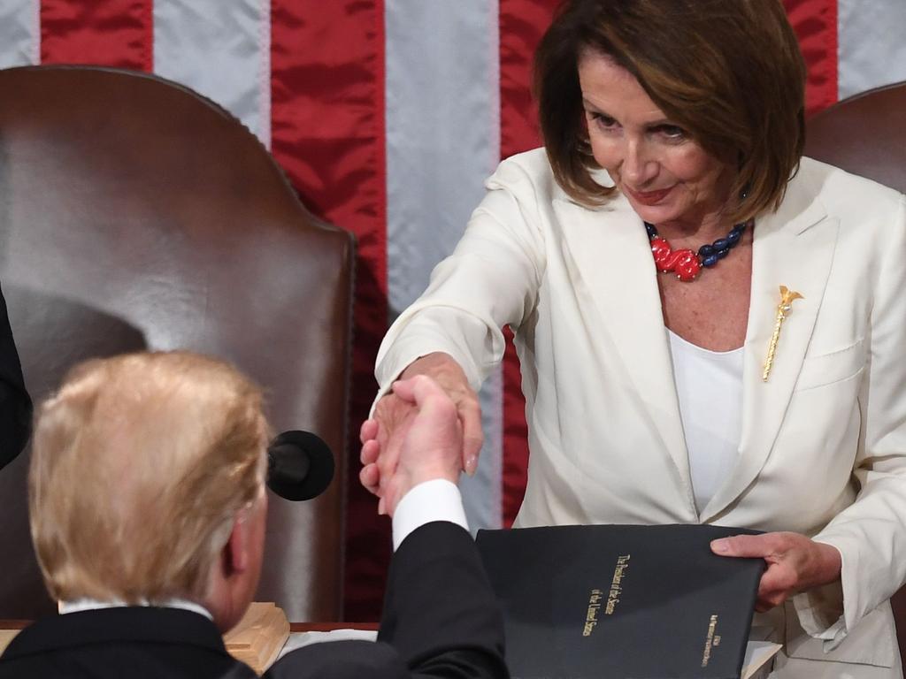 Donald Trump shakes hands with Nancy Pelosi at the 2019 State of the Union address. Picture: AFP