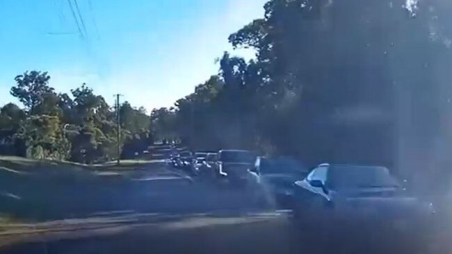 The huge line-up along Ritchie Rd near Pallara State School.