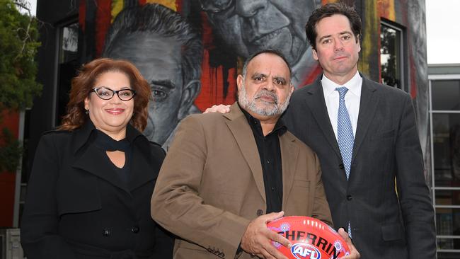 Tanya Hosch, Michael Long and AFL chief executive Gillon McLachlan pose ahead of Sir Doug Nicholls Round last year. Picture: Quinn Rooney/Getty Images