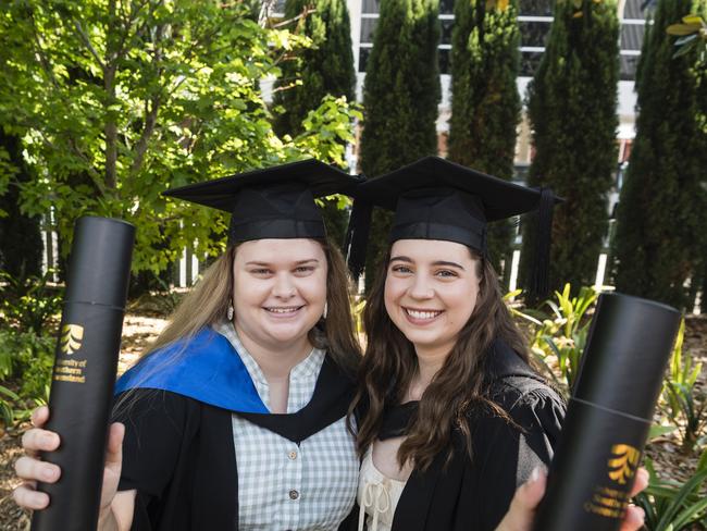 Bachelor of Nursing graduates Tione Smith (left) and Tanisha Thorne at a UniSQ graduation ceremony at Empire Theatres, Tuesday, October 31, 2023. Picture: Kevin Farmer