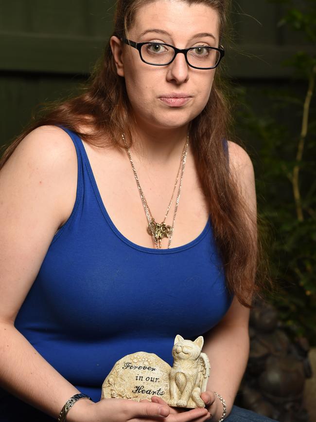 Reanna Pierce with a memorial statue for Mytzle. Picture: Lawrence Pinder