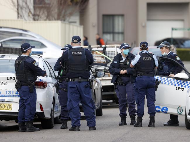 Police outside the Sydney home. Picture: Jonathan Ng