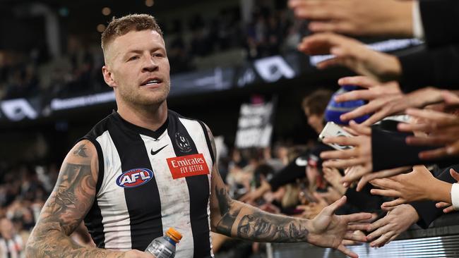 Jordan De Goey with fans at the MCG. Pic: Michael Klein.