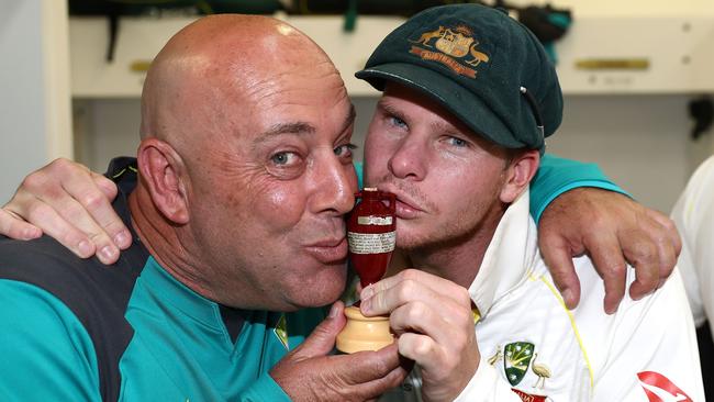 Australian coach Darren Lehmann (left) and captain Steve Smith with the Ashes urn after the match.