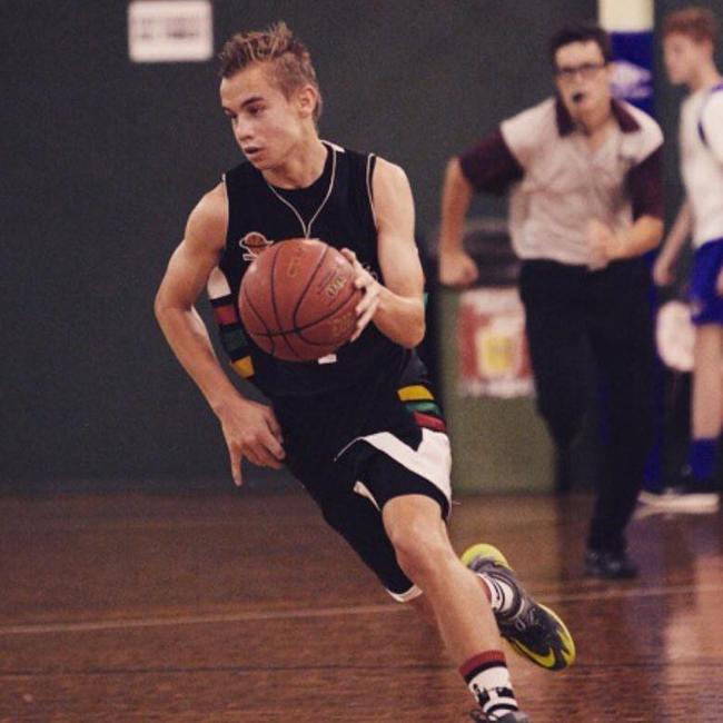 Jamie McCowan, who passed away last week, playing junior basketball for the Southern Districts Spartans.