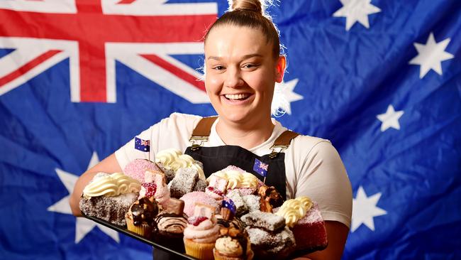 Chloe Kelly, baker and inventor of Otto's Australia Day treats which include iIced VoVo cupcakes, lamington donuts and Golden Gaytime cupckaes. Picture: Alix Sweeney