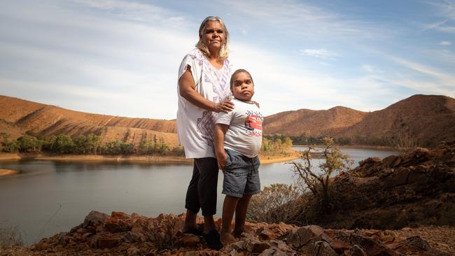 Marilyn Coulthard with Colwyn, 10, and their family have moved back to Leigh Creek to live on their ancestral lands. Pictured here at Aroma Dam. Picture: Brad Fleet