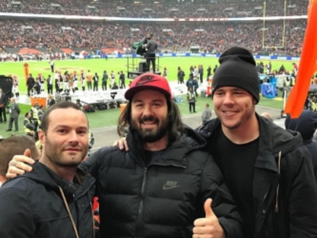 Boyd Cordner, Aaron Woods and David Klemmer at an NFL game in London.