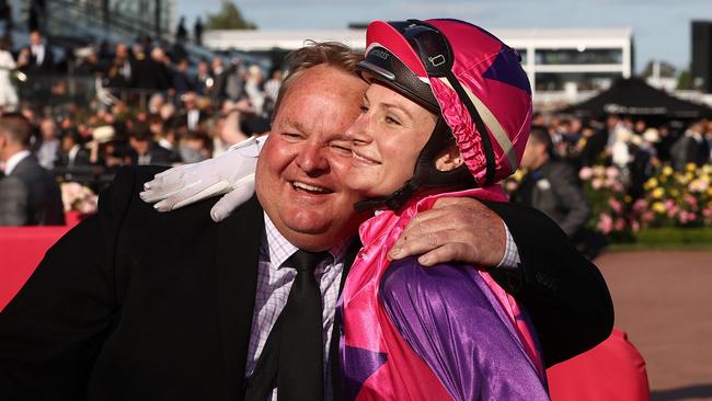 Jamie Kah hugs trainer of Cause For Concern Shawn Mathrick after winning The Damien Oliver. Picture: Michael Klein