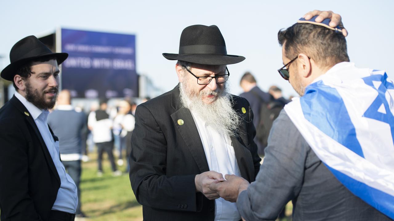 Men at the vigil for Israeli civilians who died in the Hamas terror attack. Picture: NCA NewsWIRE / Monique Harmer