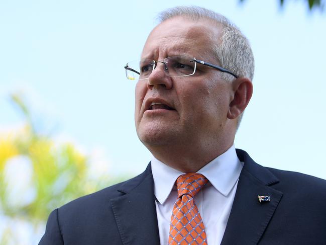 Australian Prime Minister Scott Morrison takes questions during a doorstop at the Australian High Commission in Port Vila, Vanuatu, Wednesday, January 16, 2019. The prime minister will discuss Australian infrastructure investment, the Pacific labour hire scheme, and building cultural, economic and social ties between the two countries. (AAP Image/Dan Himbrechts) NO ARCHIVING