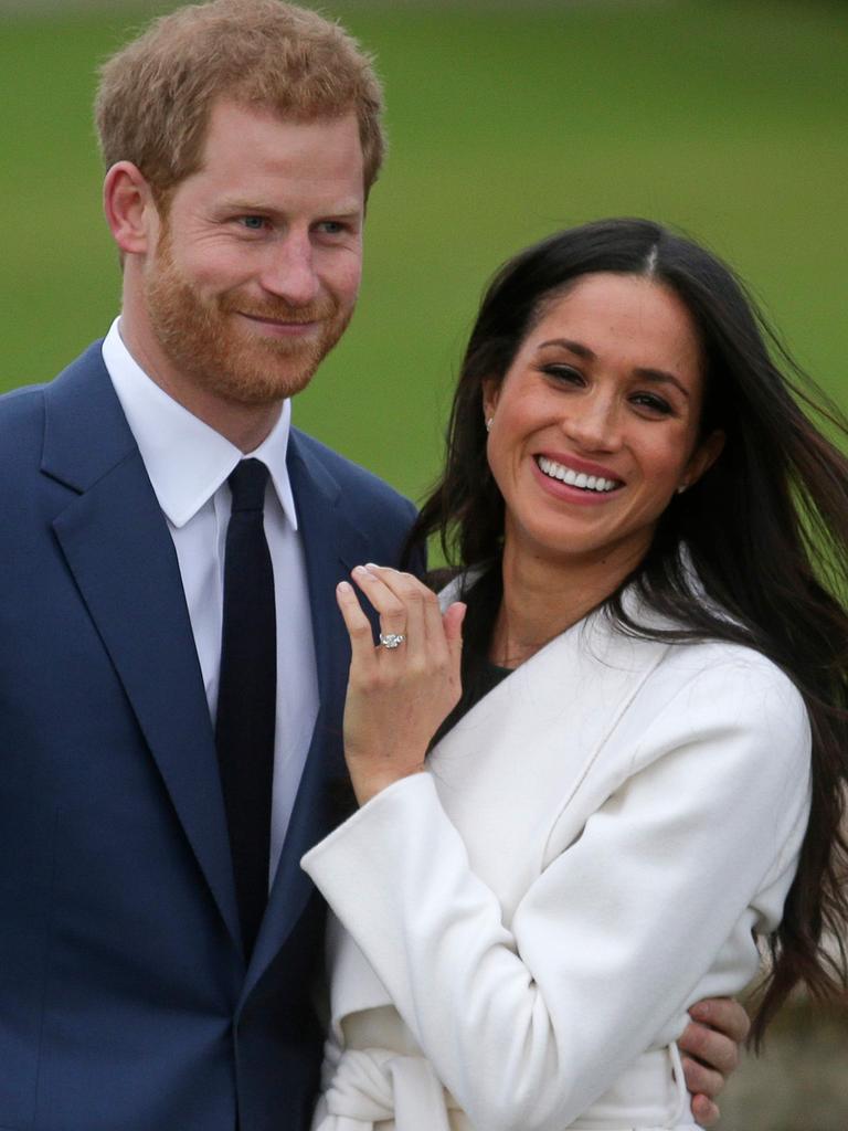 Meghan shows off her ring. Picture: Daniel Leal-Olivas/AFP