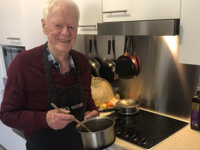 Ray McGimpsey, 95, getting ready to try out another Men's Kitchen recipe in his Belrose home. Picture: Jim O'Rourke