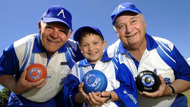 Cooper Hocking, 7, became SA's youngest pennant lawn bowler on Saturday when he lined up for Adelaide alongside Ross de Laine, 74, and Warwick Armour, 80. Picture: Noelle Bobrige