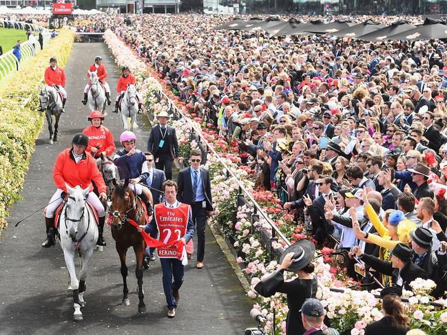 MELBOURNE, AUSTRALIA - NOVEMBER 07:  Corey Brown riding Rekindling celebrates as he returns to scale after winning race 7, the Emirates Melbourne Cup, during Melbourne Cup Day at Flemington Racecourse on November 7, 2017 in Melbourne, Australia.  (Photo by Quinn Rooney/Getty Images)