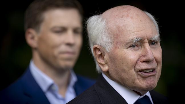 Former prime minister John Howard on the campaign trail with the MP for Ryan, Julian Simmonds, at Brookfield Gardens Nursery. Picture: Sarah Marshall