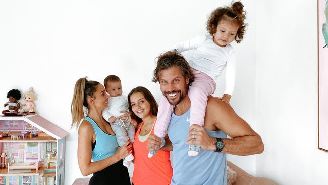 Sam Wood, his wife Snezana and daughters Charlie, Eve and Willow working out at home. Picture: Supplied