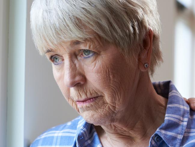 Serious Senior Woman With Adult Daughter At Home